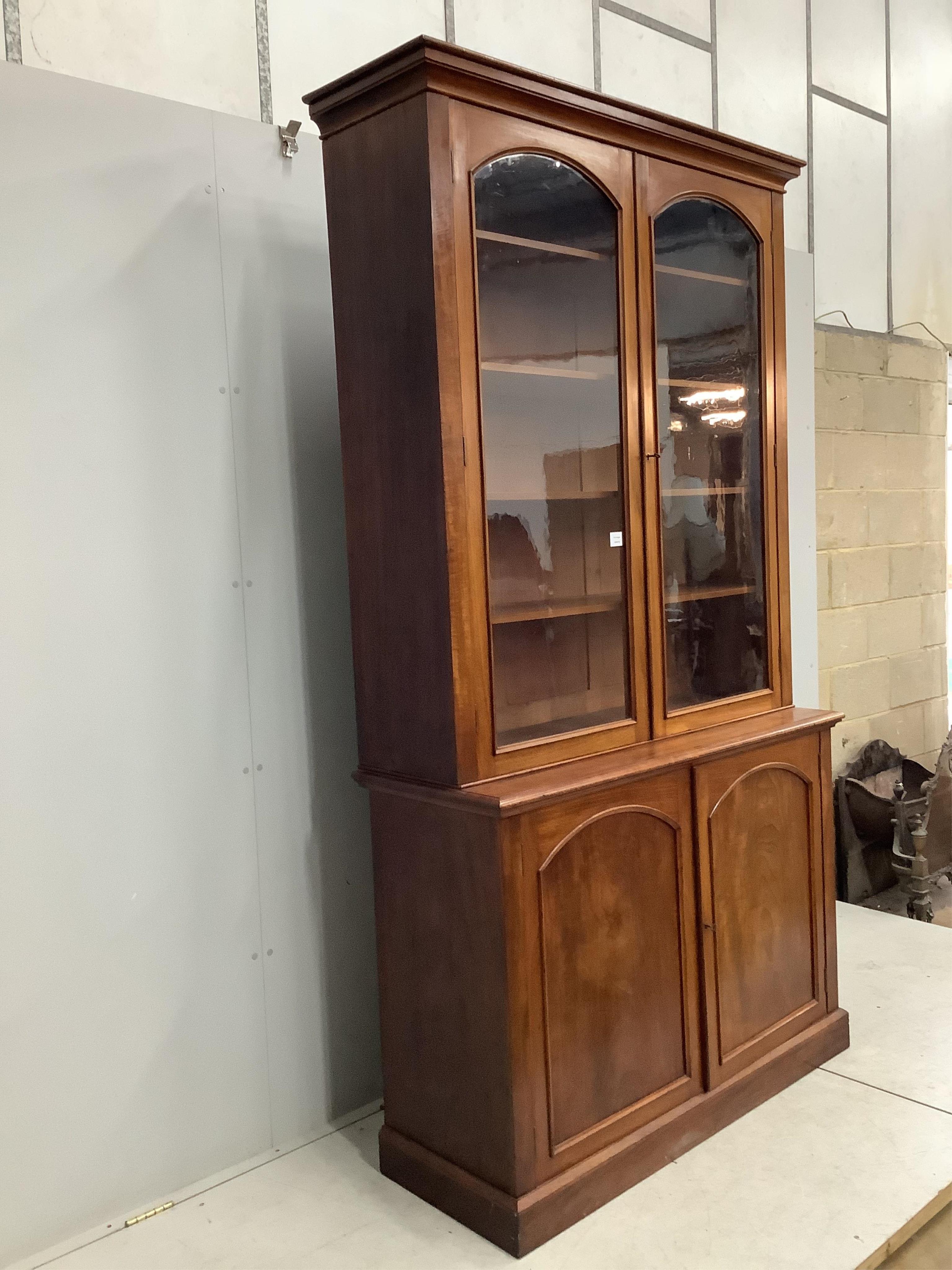 A Victorian mahogany library bookcase, width 127cm, depth 49cm, height 236cm. Condition - fair